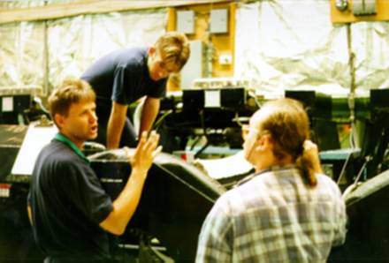 Photo - Technicians working on 82-30 Pinspotter
