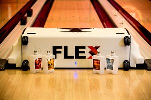 Photo - Kegel FLEX on a bowling lane surrounded by Kegewl products