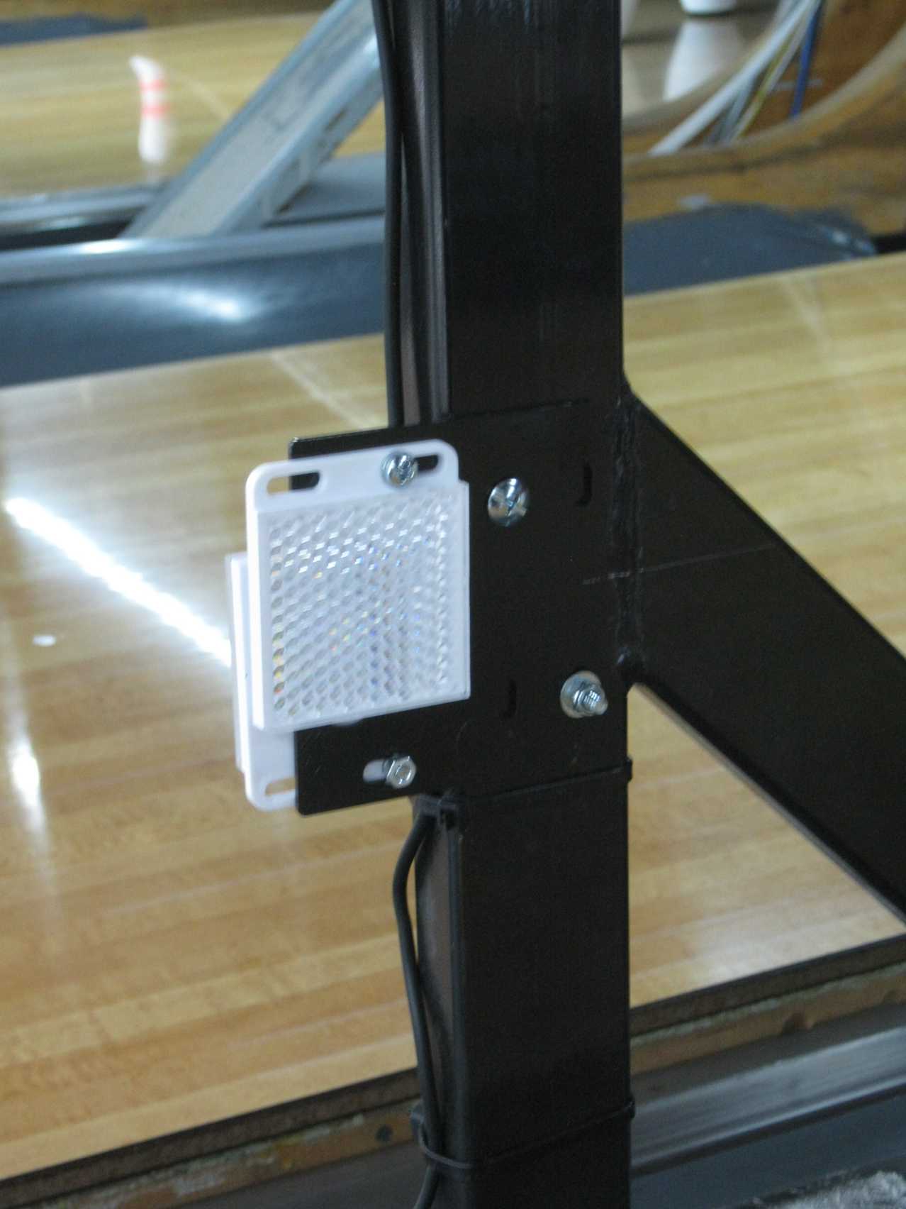 Photo - MachineMinder IR reflector mounted on mask unit leg