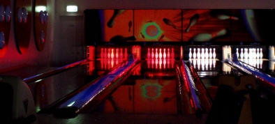 Photo - looking down toward lanes 1 and 2 the pins are lit with red LED light